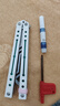 yy钢鹦鹉螺 夜光款蝴蝶刀【桔梗balisong】不锈钢内衬安全未开刃 白绿白刃 实拍图