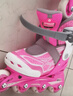 米高轮滑鞋儿童溜冰鞋直排轮可调尺码透气培训初级教学生用旱冰鞋MI0 粉色 MI0 S +(推荐鞋码29-32内长18.5-21.5) 实拍图
