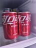 可口可乐（Coca-Cola）汽水 碳酸饮料 200ml*12罐  迷你摩登罐 新老包装随机发货 实拍图