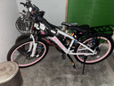 永久山地自行车成人山地车学生铝合金变速油碟刹内走线男女士单车赛车 辐条/白粉色/竞速轴承/超强减震 24寸【适合：140-170cm】 24速【定位变速器】 实拍图