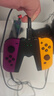 任天堂（Nintendo） Switch2/1配件 Pro限定手柄/joycon左右手柄 官方全新原装 joy-con紫橙左右手柄-NS1 实拍图