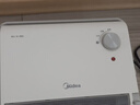 美的（Midea）【小身材】暖风机家用/小太阳取暖器/小型电暖器/电暖气/电热风扇/暖手宝台地两用速热便携HFU15D 实拍图