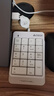 双飞燕（A4TECH）FK13 有线键盘 笔记本外接数字小键盘 财务会计收银柜台证券用 USB接口 伸缩线 象牙白 实拍图
