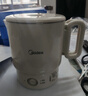 美的（Midea）第二代便携式可折叠烧水杯电热水壶差旅 保温泡面杯小容量迷你无缝内胆 0.7升 SH07S104 实拍图