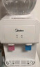 美的（Midea）饮水机 国家补贴家用台式小型制热饮水机 实用便携即热烧水壶桶装水桌面简易收纳小型迷你台面水吧 白色 温热型 YR1220T 实拍图