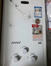 奇田（Qitian）天然气热水器平衡式家用 燃气热水器液化气 热水器洗澡家用 新国标铜水箱 安装浴室 JSG12-A 6L -03白（数显）新国标品质 天然气12T 实拍图