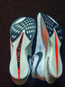 耐克男子轻便专业跑步鞋秋季公路竞速官方NIKE STREAKFLY HF6416 100白/铁架黑/薄雾黑蓝/白金色/亮深红/金属银 43 实拍图