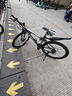 金武端自行车成人山地车公路赛车单车骑行变速超轻越野中学生初中青少年 顶配升级版-辐条轮-黑白色 27.5寸24速 实拍图