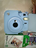 富士（FUJIFILM）instax  mini12 一次成像 立拍立得相机 mini12 绣球蓝 套餐八（官方标配+相机包+相册+白边相纸20张） 实拍图