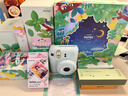 富士（FUJIFILM）mini12自带美颜拍立得相机花与她礼盒版含花花相纸迷你7+/se/90/99胶片相机升级版 薄荷绿【花与她礼盒】 套餐二【标配套餐共20张相纸+水晶壳+升级版礼包】 实拍图