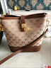喵小姐轻奢高端品牌女士新款百搭单肩斜挎包包女包复古印花大容量水桶包 咖啡色(精致小众高级感) 实拍图