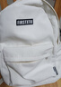 双星书包初中女背包大容量高中大学生双肩包校园简约百搭耐磨防泼水 白色（带黑球挂件） 实拍图