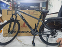 凤凰（Phoenix）山地车自行车成年人男女学生铝合金禧玛诺变速减震油碟山地自行车 深灰/钢架/辐条轮/全轴承 21速进口禧玛诺/26寸 实拍图