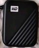 西部数据（WD） 2.5英寸移动硬盘通用防震 保护包 硬壳防震包 保护套 硬盘包 WD2.5英寸 硬壳包 黑色 实拍图