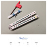 yy钢鹦鹉螺 夜光款蝴蝶刀【桔梗balisong】不锈钢内衬安全未开刃 白绿白刃 实拍图