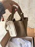 Songmont中号菜篮子系列女设计师款头层牛皮大容量通勤手提包 奶昔白 帆布内胆 现货 实拍图
