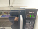 格兰仕（Galanz）【国家补贴】微波炉烤箱一体机光波20L家用700W节能平板易清洁智能菜单多功能小型烧烤解冻预约DG 全新机器 实拍图