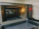 格兰仕家用微波炉微烤一体机烤箱平板智能变频900瓦23升 一级能效下拉门光波炉A7TM 黑色 实拍图