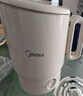 美的（Midea）第二代便携式可折叠烧水杯电热水壶差旅 保温泡面杯小容量迷你无缝内胆 0.7升 SH07S104 实拍图