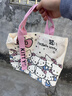卡通蝴蝶结新款日系极简帆布包单肩上课通勤耐磨手提包 樱桃kt猫27*24cm 实拍图