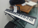 特伦斯手卷钢琴88键折叠电子钢琴便携成人儿童演奏钢琴键盘 实拍图