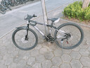 EG7山地自行车成人学生变速越野单车双减震赛车26寸青少年男女 辐条【加厚防滑轮-更安全】黑白 26寸21速【适合：160-180CM】 实拍图
