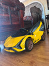 星辰皓兰博基尼儿童电动车四轮玩具可坐人小孩宝宝婴儿遥控汽车闪电SIAN 黄色四驱+遥控+摇摆+皮座+软轮 实拍图