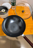九阳（Joyoung）炒锅铁锅无涂层精铁锅炒菜锅炉灶通用32cm带盖CF32-C121 实拍图