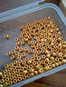 囍蓝足金999金珠黄金小金珠金豆小克重单颗0.01g定制 合单0.2g内运费3元，超出包邮，重量大小随机/多退少补 0.01g 实拍图