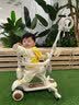 嘻优米滑板车儿童1-3岁防侧翻宝宝6-12岁可坐可骑可推小孩脚踏板车 【 滑/骑二合一款】加大软座 奶咖米 实拍图