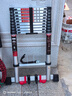 德力西（DELIXI）伸缩梯铝合金加厚工程梯便携多功能带钩单面直梯3.9米 实拍图