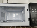 格兰仕微波炉京东自营 家用小型20升 大平板底盘  700瓦省电智能菜单 一键解冻 薄膜按键SF20 实拍图