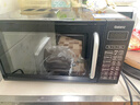 格兰仕（Galanz）【国家补贴】微波炉烤箱一体机光波20L家用700W节能平板易清洁智能菜单多功能小型烧烤解冻预约DG 全新机器 实拍图