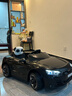 星辰皓奥迪儿童电动车四驱汽车遥控四轮宝宝玩具车可坐人童车RSGT 黑色+四驱+遥控+摇摆+皮座+软轮 实拍图