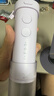 飞利浦电动冲牙器小净瓶 家用水牙线 洗牙器 伸缩旅行便携式洁牙器 三种模式三款专业喷嘴 新年礼物 就酱紫HX3331/03 3支喷头 实拍图