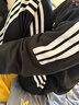 阿迪达斯（adidas）长裤男女秋冬宽松透气直筒裤跑步运动防风休闲裤  黑白 XL 实拍图