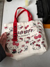 卡通蝴蝶结新款日系极简帆布包单肩上课通勤耐磨手提包 红色KT猫＋飘带 实拍图