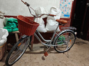 凤凰（Phoenix） 梦幻自行车男士女式成人青少年学生通勤城市复古轻便单车 樱花银色/95%免安装 26寸充气胎：适合身高165-180cm 实拍图