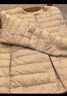 鸭鸭（YAYA）佟丽娅同款轻薄羽绒服女新款冬季短款圆领内胆修身时尚薄外套男 米白色【女款无领】 4XL 【建议155-170斤】 实拍图