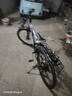 EG7山地自行车成人学生变速越野单车双减震赛车26寸青少年男女 辐条【升级减震 超强承重】黑白 26寸21速【适合：160-180CM】 实拍图