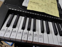 美科（Meirkergr）MK-975（智能版） 亮灯跟弹61键钢琴键多功能智能电子琴乐器 连接U盘手机pad带琴架 实拍图