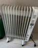 美的（Midea）【白玉】取暖器/电暖器/电暖气家用/烤火炉/13片节能速热/电热油汀/油酊/加热器/烘衣加湿HYX22N 实拍图