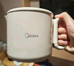 美的（Midea）第二代便携式可折叠烧水杯电热水壶差旅 保温泡面杯小容量迷你无缝内胆 0.7升 SH07S104 实拍图