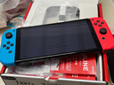 任天堂（Nintendo）【国内保税仓】Switch2/1代 OLED日版/港版游戏机续航加强版ns体感掌机便携家用主机 OLED日版红蓝64GB保税（赠2年VIP会员） 实拍图