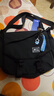 回力（Warrior）斜挎包男士挎包男女潮牌大容量单肩包学生情侣休闲运动小背包邮差 黑色【带太空人挂件】 实拍图