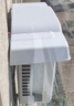 空调外机罩室外机盖板雨棚防晒防尘防雨防雪防护保护遮雨遮阳通用 白色 导流槽款加厚1-1.5P通用送两条绳 实拍图