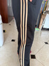 阿迪达斯（adidas）长裤男女秋冬宽松透气直筒裤跑步运动防风休闲裤  黑金 L 实拍图