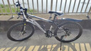 金武端自行车成人山地车公路赛车单车骑行变速超轻越野中学生初中青少年 顶配升级版-辐条轮-黑白色 24寸24速 实拍图
