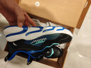 安踏儿童运动鞋男女童跑步鞋秋冬季网革旋钮扣犟弹科技学生赤焰跑鞋 【男革面】黑/蓝/绿5523N-2 36 鞋内长23cm 实拍图