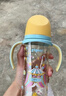 贝亲（Pigeon）自然成长翻盖直饮吸管 大童奶瓶330ml 马戏团 18月+ AA279 实拍图